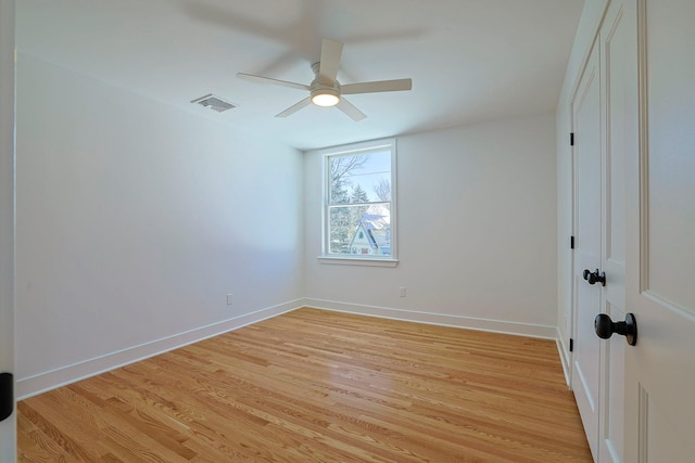 unfurnished room with ceiling fan and light hardwood / wood-style flooring