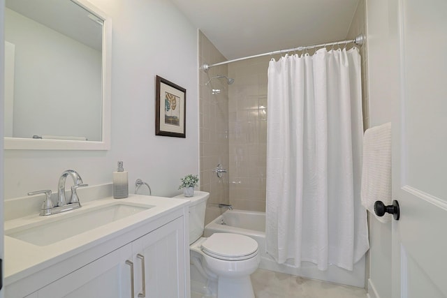 full bathroom with shower / tub combo with curtain, vanity, and toilet