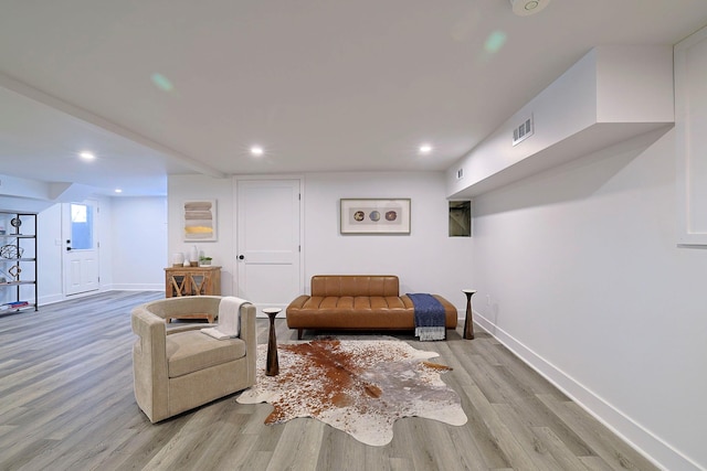 sitting room featuring light wood-type flooring