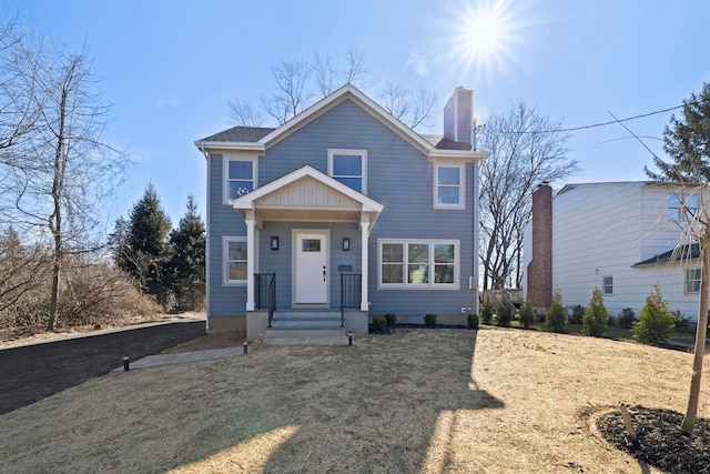 view of front of property with a chimney