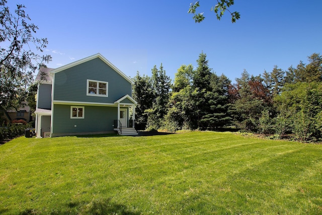 12 Observatory Dr, Croton-On-Hudson, NY 10520 - rear view of property with a yard and central air condition unit