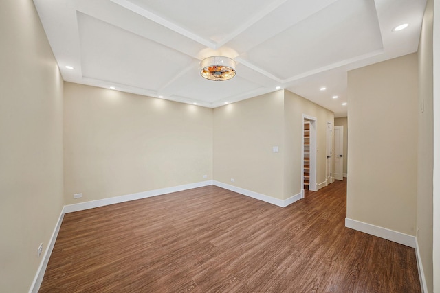 spare room with hardwood / wood-style flooring