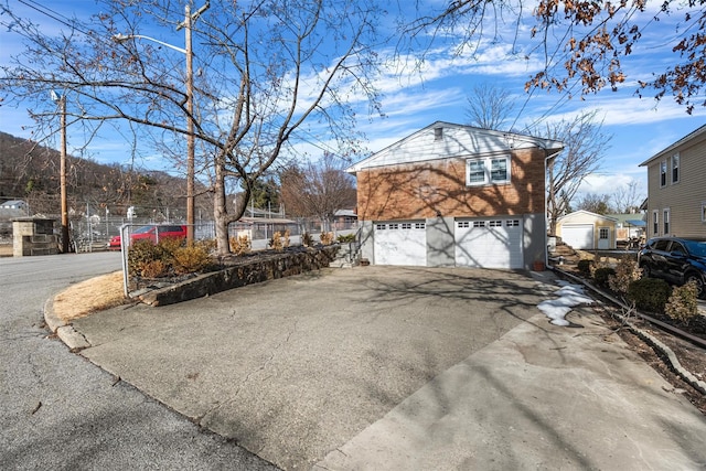 view of property exterior with a garage