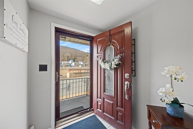 property entrance featuring a mountain view