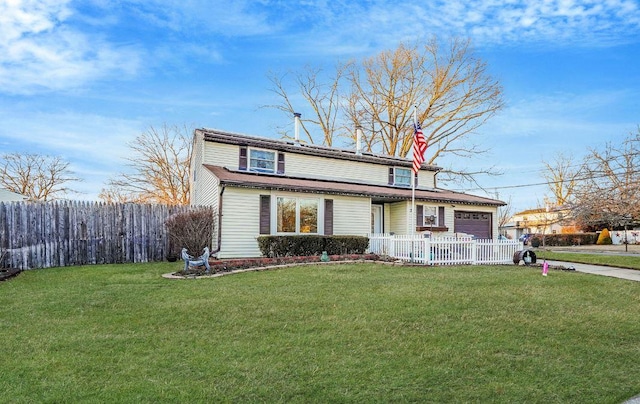 front facade featuring a garage and a front lawn