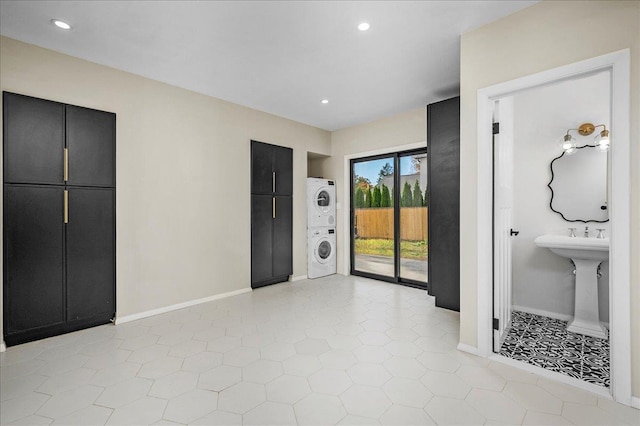 interior space with stacked washer and dryer