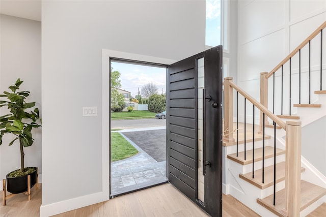 entrance foyer with light hardwood / wood-style floors