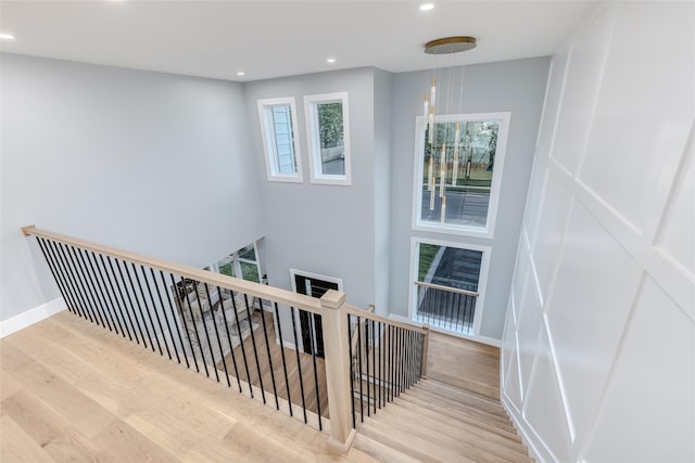 stairway with wood-type flooring