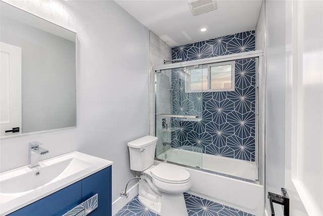 full bathroom featuring vanity, toilet, and combined bath / shower with glass door