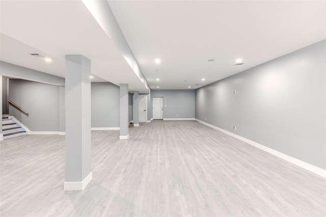 basement with light wood-type flooring