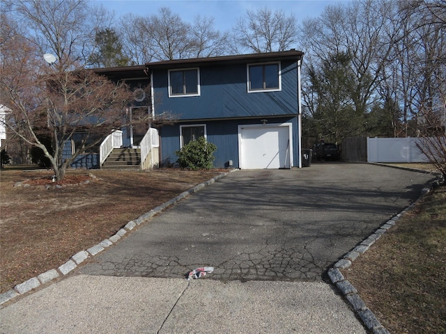 view of front of home with a garage