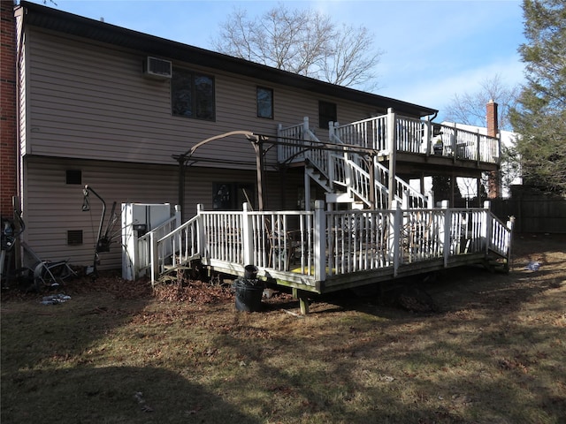 back of property featuring a deck