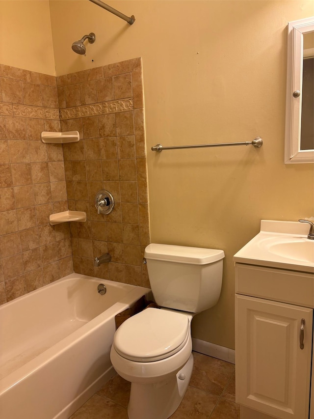 full bath with tile patterned flooring, toilet, vanity, baseboards, and shower / bathing tub combination