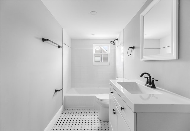 full bathroom featuring vanity, tile patterned flooring, tiled shower / bath combo, and toilet