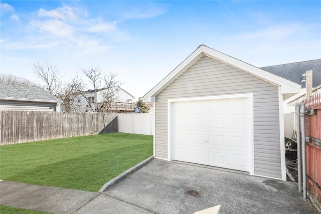 garage with a lawn