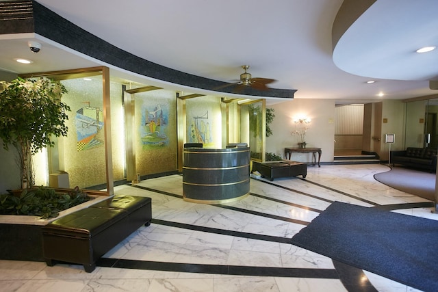 reception area featuring ceiling fan