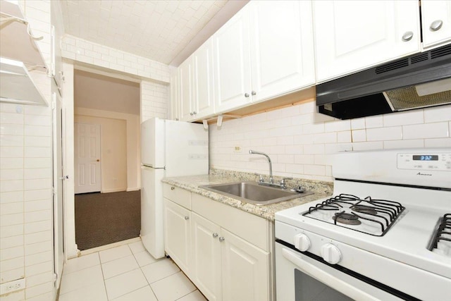 kitchen featuring white cabinetry, sink, and white appliances