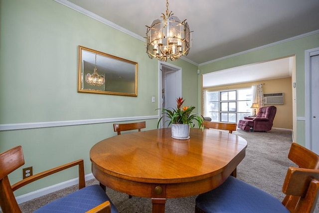 carpeted dining room with ornamental molding, a notable chandelier, and a wall unit AC