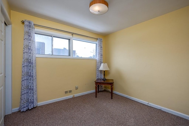 view of carpeted spare room