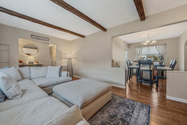 living room featuring beam ceiling, a notable chandelier, and dark hardwood / wood-style flooring