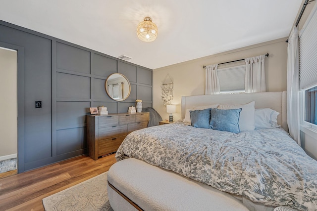 bedroom featuring light hardwood / wood-style floors