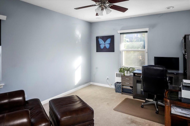 carpeted office with ceiling fan