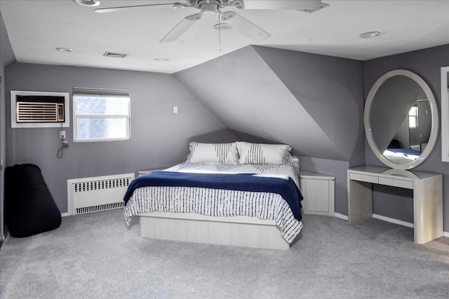 carpeted bedroom featuring radiator heating unit, a wall unit AC, ceiling fan, and vaulted ceiling