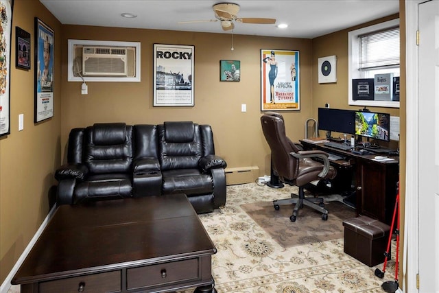 home office with a baseboard heating unit, a wall mounted AC, and ceiling fan