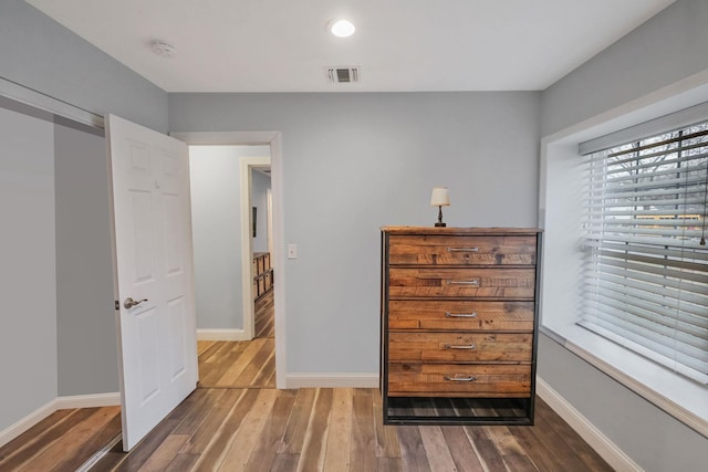 bedroom with wood-type flooring