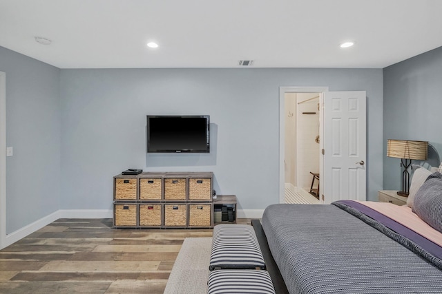 bedroom featuring hardwood / wood-style flooring