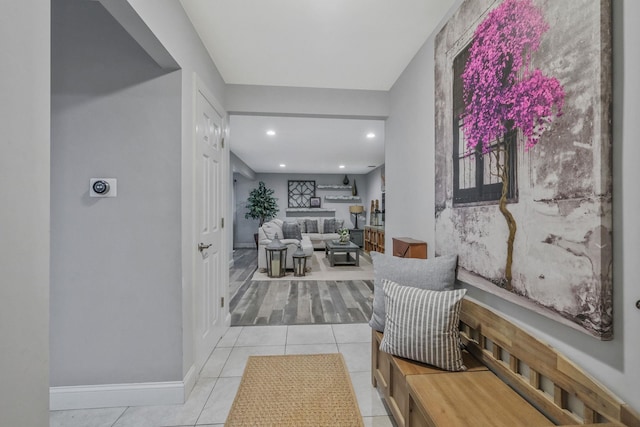 hall with light tile patterned flooring