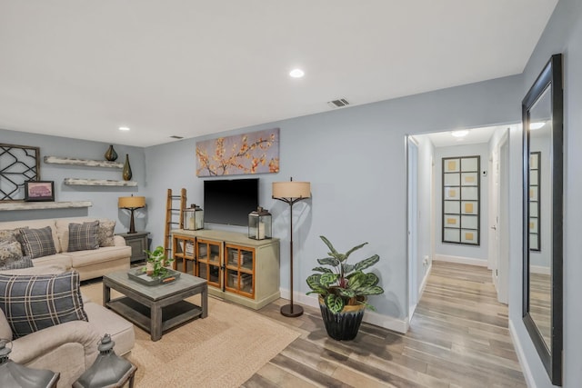 living room featuring hardwood / wood-style floors