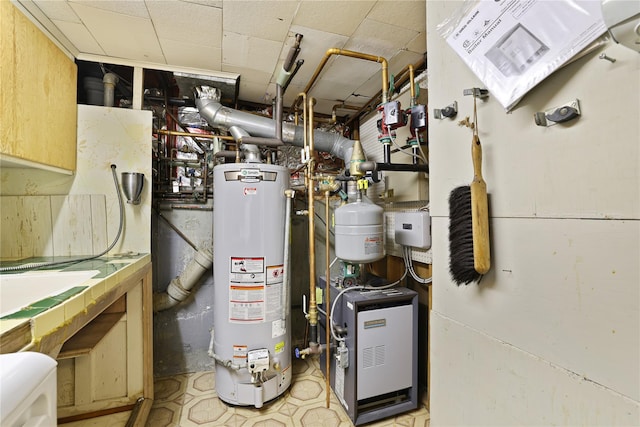 utility room with water heater