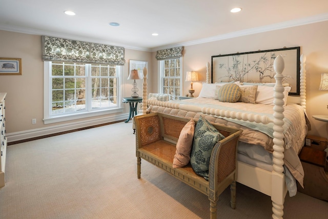 carpeted bedroom with baseboards, crown molding, and recessed lighting