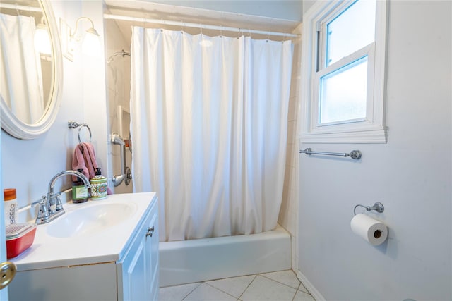 bathroom with vanity, shower / bathtub combination with curtain, and tile patterned floors