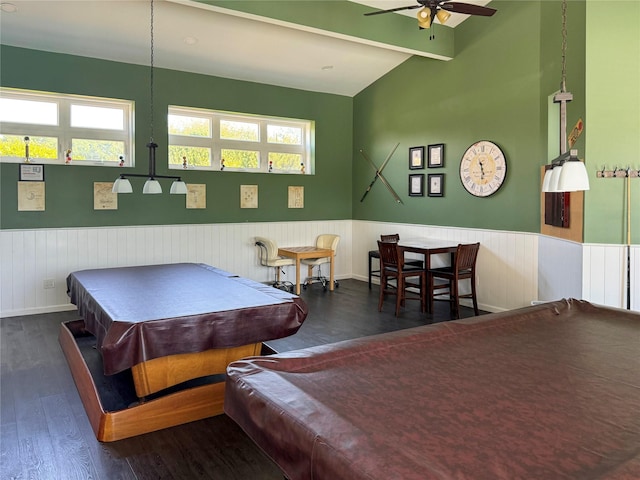 recreation room featuring billiards, vaulted ceiling with beams, a wealth of natural light, and wainscoting