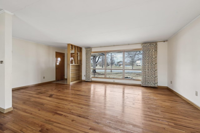 unfurnished living room with wood-type flooring