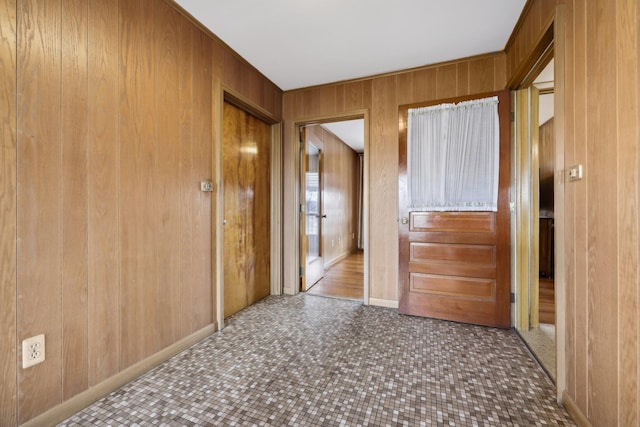 hallway with wooden walls