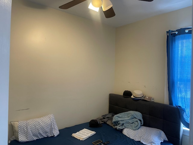 bedroom featuring ceiling fan