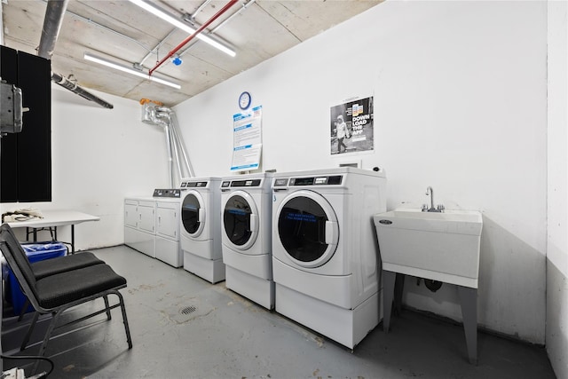 laundry room featuring washing machine and dryer