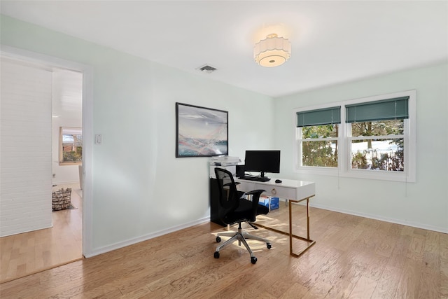 office space featuring light wood-type flooring