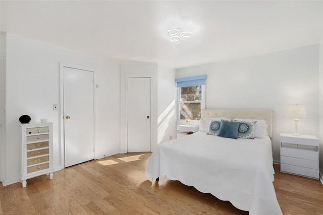 bedroom featuring light hardwood / wood-style flooring