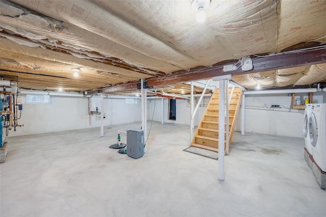 basement featuring washing machine and dryer