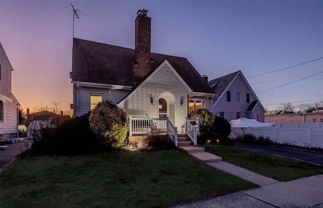 view of front of house with a yard