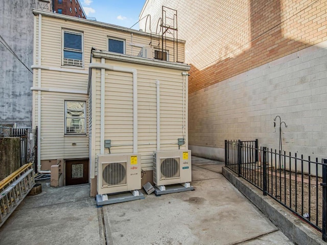 view of patio featuring ac unit