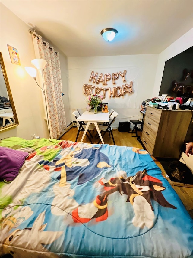 bedroom featuring light hardwood / wood-style floors