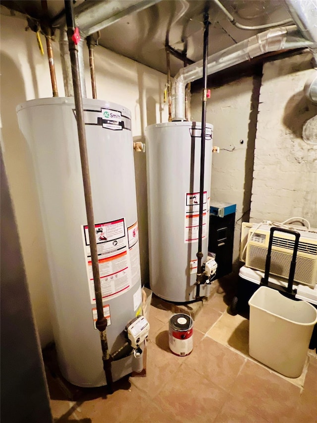 utility room featuring a wall unit AC and water heater