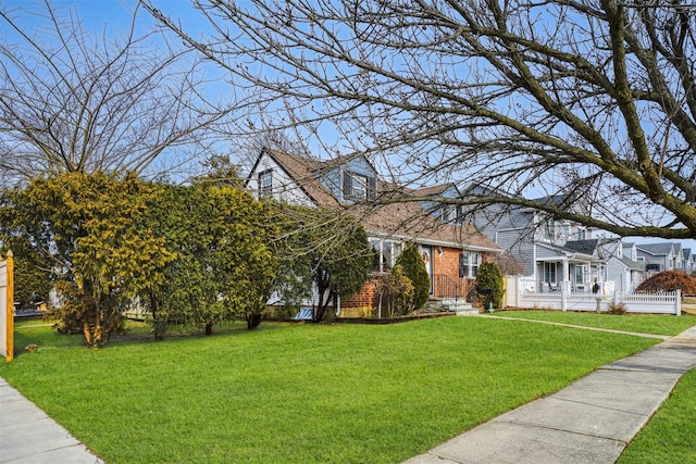 view of front of house featuring a front yard