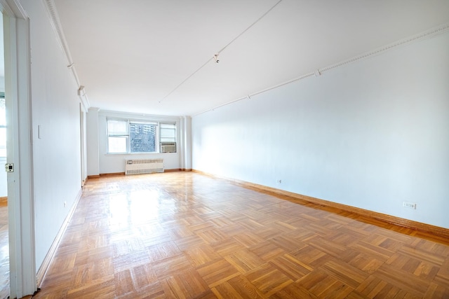 3725 Henry Hudson Pkwy Unit 6D, Bronx, NY 10463 - spare room featuring parquet flooring, radiator heating unit, and cooling unit