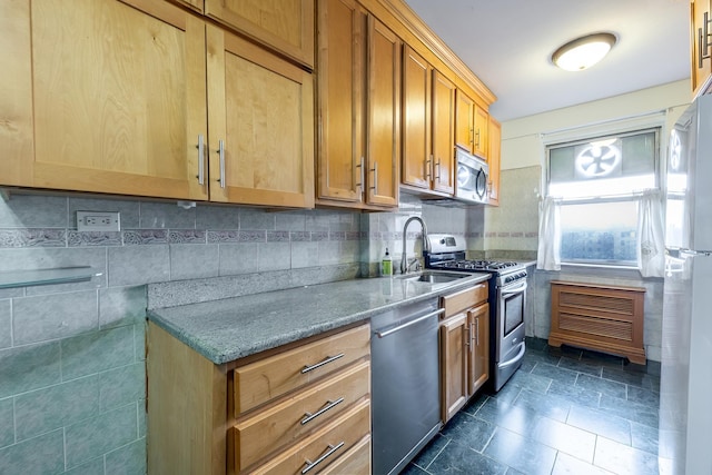 3725 Henry Hudson Pkwy Unit 6D, Bronx, NY 10463 - kitchen featuring appliances with stainless steel finishes, sink, decorative backsplash, and stone counters